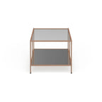Tavolino rettangolare color oro con piano in vetro e ripiano inferiore