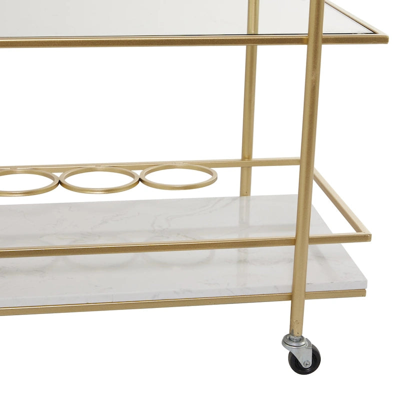 Carrello portabevande dorato con ripiani e maniglie in vetro e marmo